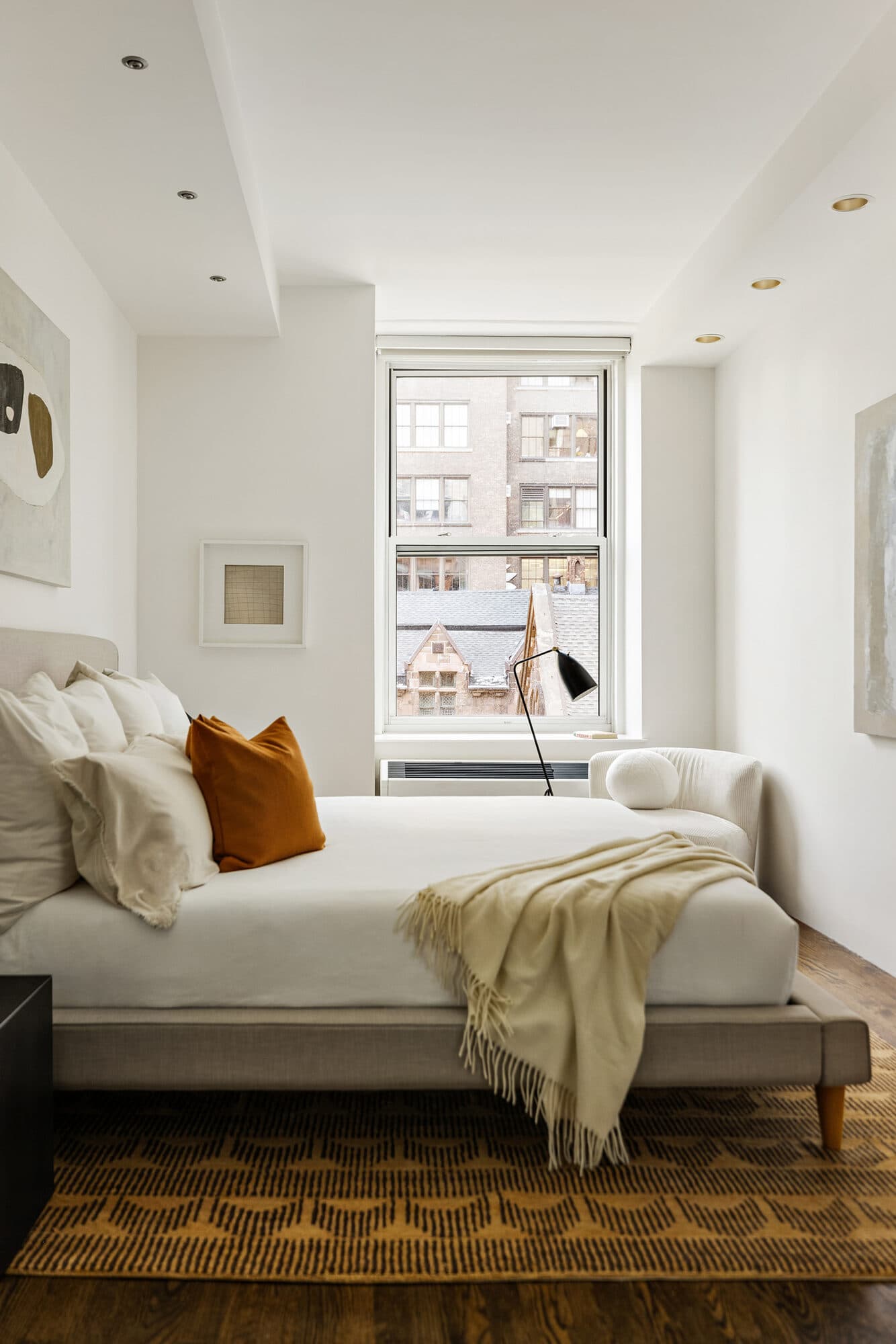Bedroom with bright window light after the apartment renovation