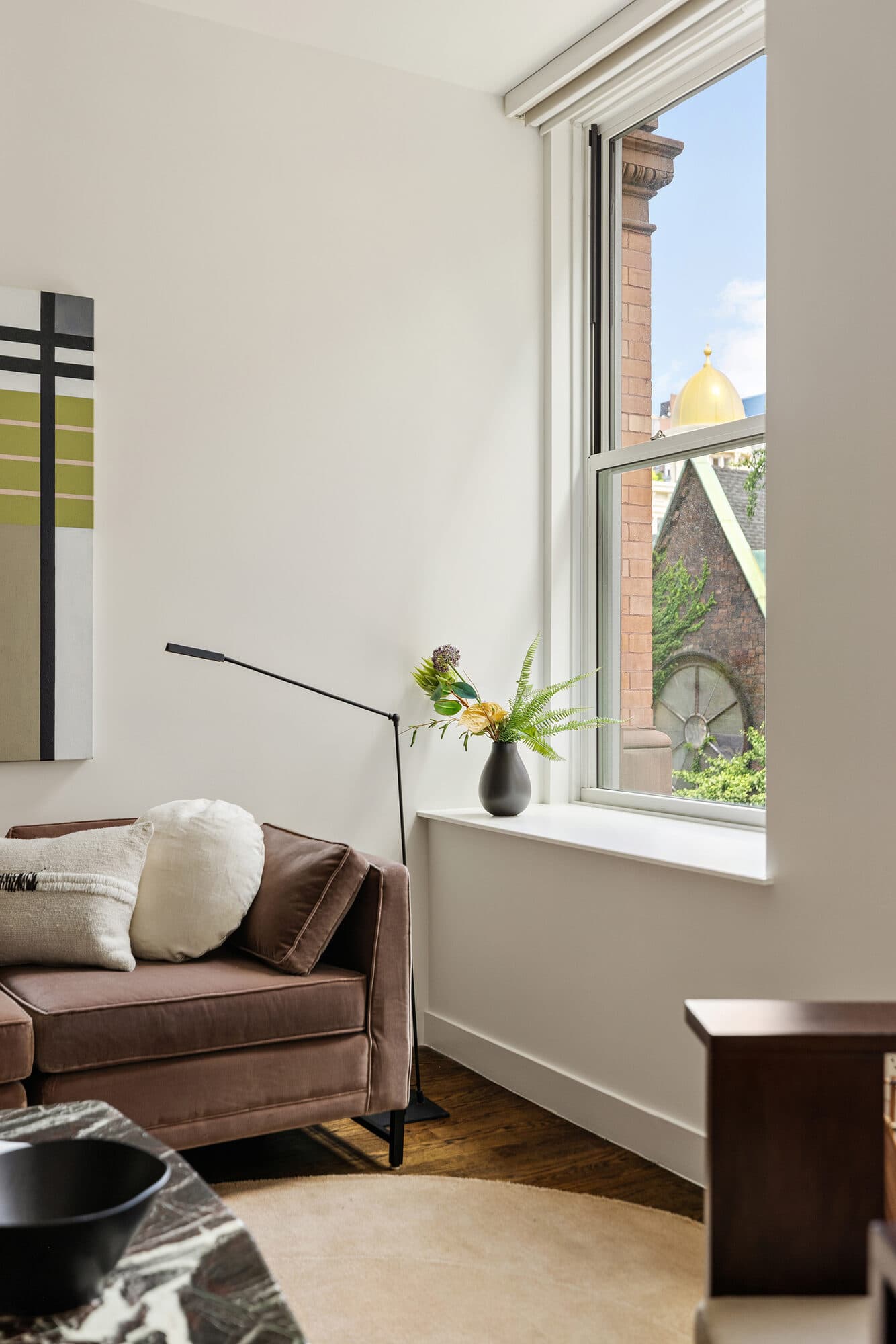 Sitting nook by the window in the renovated Gramercy Park apartment