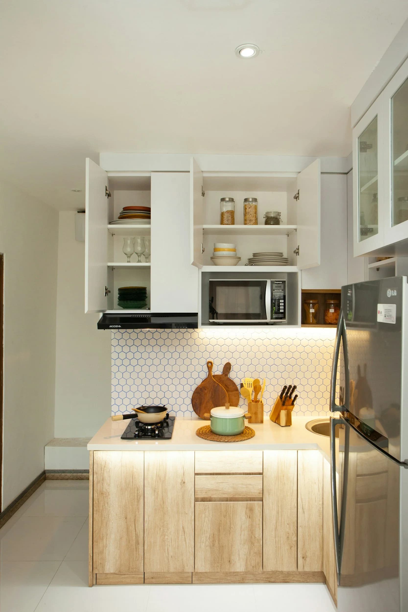 Premium kitchen renovation with island seating, custom cabinetry, and layered lighting